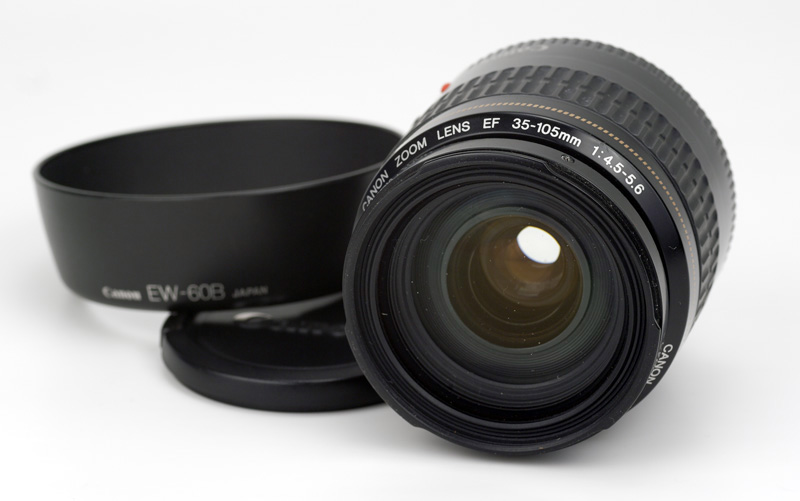 Canon EF 35-105mm F4.5-5.6 USM Front Lens View showing model name inscription, with Lens Hood EW-60B