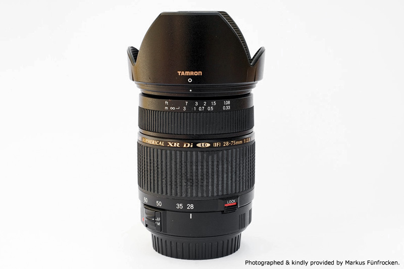 Tamron AF 28-75mm F2.8 SP XR Di LD Aspherical Side View showing part of the model name inscription and dedicated lens hood mounted to the lens